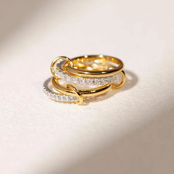 A Four Ring Interlocking Ring With A Personalized Design Ins Style